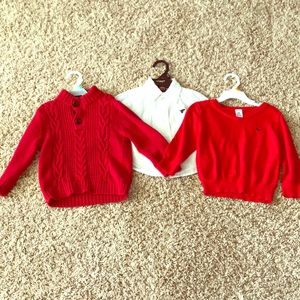 Two red sweaters and a white shirt